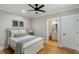 Bright bedroom with a full bathroom, hardwood floors and natural light at 2101 Thomas Rd, Canton, GA 30115