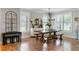 Beautiful dining room featuring a rustic table with bench seating and large windows at 2101 Thomas Rd, Canton, GA 30115