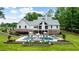 Gorgeous two-story home featuring a pool, spa, patio, and beautifully landscaped yard at 2101 Thomas Rd, Canton, GA 30115