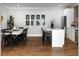 Open kitchen and dining area with modern decor and ample seating at 2101 Thomas Rd, Canton, GA 30115