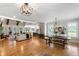 Expansive living space with open floor plan, combining living, dining, and kitchen areas at 2101 Thomas Rd, Canton, GA 30115