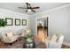 Comfortable sitting area with plush chairs, stylish decor, and open access to other rooms at 2101 Thomas Rd, Canton, GA 30115