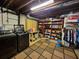 Finished basement with laundry, storage and display shelving at 4094 Carlisle Pl, Stone Mountain, GA 30083