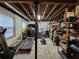 Unfinished basement with exposed ceiling featuring workout equipment and extra storage at 4094 Carlisle Pl, Stone Mountain, GA 30083