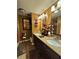 Bathroom featuring double sinks, granite countertops, and natural light at 4094 Carlisle Pl, Stone Mountain, GA 30083