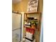 Bathroom features a shelf with decorative accessories, a shower, and a toilet at 4094 Carlisle Pl, Stone Mountain, GA 30083