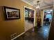 Foyer with slate flooring, decorative painting, and a glimpse into the dining and living areas at 4094 Carlisle Pl, Stone Mountain, GA 30083