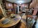 Well-appointed kitchen with stainless steel appliances, wood cabinets, and an adjacent breakfast nook at 4094 Carlisle Pl, Stone Mountain, GA 30083