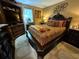 Spacious bedroom features a king-sized bed and built in media center at 4094 Carlisle Pl, Stone Mountain, GA 30083