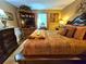 Well-appointed bedroom with a large bed, dresser, and other furnishings at 4094 Carlisle Pl, Stone Mountain, GA 30083