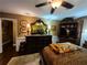 Comfortable bedroom featuring a ceiling fan and beautiful furnishings at 4094 Carlisle Pl, Stone Mountain, GA 30083