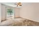 Neutral bedroom with natural light, carpet flooring, and a window view for a serene space at 113 Hitchcock Dr, Villa Rica, GA 30180