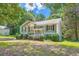Charming two-story home featuring a welcoming front porch and well-maintained lawn at 113 Hitchcock Dr, Villa Rica, GA 30180