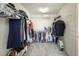 Well-organized walk-in closet with shelving and hanging rods, maximizing storage and functionality at 4003 Coachman Ct, Cumming, GA 30040