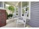 Cozy front porch with rocking chairs, perfect for enjoying the outdoors at 4003 Coachman Ct, Cumming, GA 30040