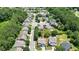 Charming neighborhood featuring well-maintained homes, mature trees, and manicured lawns creates an inviting atmosphere at 4003 Coachman Ct, Cumming, GA 30040
