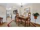 Cozy dining area featuring traditional furnishings and a view into the kitchen space at 4081 Riverlook Se Pkwy # 13, Marietta, GA 30067
