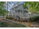 Exterior of multi-story building with covered decks, showcasing its architecture and curb appeal at 4081 Riverlook Se Pkwy # 13, Marietta, GA 30067
