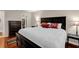 Inviting primary bedroom features a large bed, neutral decor, and ensuite access at 4081 Riverlook Se Pkwy # 13, Marietta, GA 30067