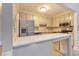 Open kitchen with stainless steel appliances, granite countertops, and a breakfast bar at 440 Forestgate Ct, Atlanta, GA 30350