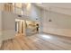 Bright living room with vaulted ceilings, modern floors, and an open concept design at 440 Forestgate Ct, Atlanta, GA 30350