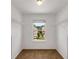 Walk-in closet with white wire shelving, a light fixture, and a window at 1212 Ithaca Dr, Mcdonough, GA 30253