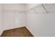 The walk-in closet has white wire shelving and carpet flooring at 1212 Ithaca Dr, Mcdonough, GA 30253