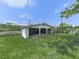 Open-air garage with block construction and a concrete floor on a sunny day at 14367 Fincher Rd, Canton, GA 30114