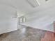 Open kitchenette area that includes wood cabinets and tile flooring at 14367 Fincher Rd, Canton, GA 30114