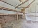 A rustic shed interior featuring wood framing and weathered walls, ready for renovation and customization at 14367 Fincher Rd, Canton, GA 30114