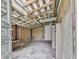 Exposed beams and unfinished walls offer a blank canvas in this shed interior, full of potential and light at 14367 Fincher Rd, Canton, GA 30114