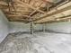 A spacious shed interior with block walls and wooden supports, perfect for storage or workshop at 14367 Fincher Rd, Canton, GA 30114