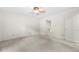 Neutral bedroom with a ceiling fan, carpet and a walk in closet at 1481 Bentley Se Ln, Marietta, GA 30067