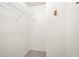 Walk-in closet featuring hanging racks and corner storage space at 1481 Bentley Se Ln, Marietta, GA 30067