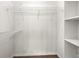 A walk-in closet with white shelving at 1481 Bentley Se Ln, Marietta, GA 30067
