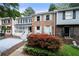 Inviting townhome with brick facade, colorful shrubbery, and tidy front lawn at 1481 Bentley Se Ln, Marietta, GA 30067