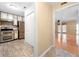 Traditional kitchen featuring tile floor, stainless steel appliances, and shaker cabinets at 1481 Bentley Se Ln, Marietta, GA 30067