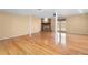 Large, versatile room with hardwood floors and a cozy brick fireplace for relaxing at 1481 Bentley Se Ln, Marietta, GA 30067