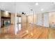 Spacious living area features hardwood floors, a brick fireplace, and natural light at 1481 Bentley Se Ln, Marietta, GA 30067