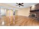 Open layout showcases beautiful hardwood floors and a brick fireplace, perfect for gatherings at 1481 Bentley Se Ln, Marietta, GA 30067