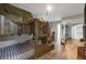 A unique bedroom featuring a custom-built bunk bed with a wooden frame and camouflage netting at 722 Ivory Trl, Woodstock, GA 30188