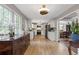 Spacious kitchen with white cabinets, stainless appliances, and abundant natural light at 722 Ivory Trl, Woodstock, GA 30188