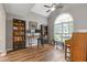 Home office space with large window, vaulted ceilings, and ample natural light at 722 Ivory Trl, Woodstock, GA 30188