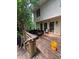 Spacious wooden back deck with seating and stairs, ideal for relaxation and enjoying the backyard views at 974 Bloomfield Dr, Lawrenceville, GA 30044
