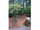 View of the wooded backyard from the deck, offering privacy and a natural setting at 974 Bloomfield Dr, Lawrenceville, GA 30044