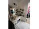 Bathroom with ample storage and a large mirror, needing decluttering and cleaning at 974 Bloomfield Dr, Lawrenceville, GA 30044