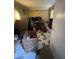 Unstaged bedroom showcasing natural light from a window at 974 Bloomfield Dr, Lawrenceville, GA 30044