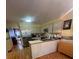 Functional kitchen with stainless steel appliances, wood floors, and ample storage at 974 Bloomfield Dr, Lawrenceville, GA 30044