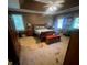 Spacious main bedroom features a ceiling fan, neutral carpeting, and natural light from two windows at 974 Bloomfield Dr, Lawrenceville, GA 30044