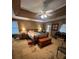 Bedroom featuring a ceiling fan and two windows, with brown paint at 974 Bloomfield Dr, Lawrenceville, GA 30044
